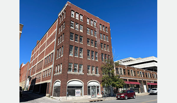photo of 6 story brick buiding.